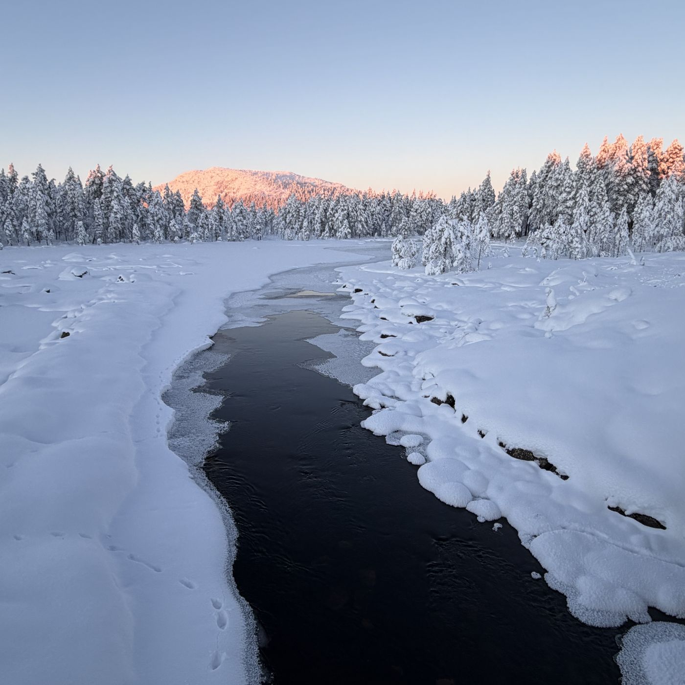 Snow-covered river landscape in Arjeplog, Swedish Lapland during winter